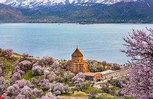 The Answer to All Your Questions A large body of water with a mountain in the background