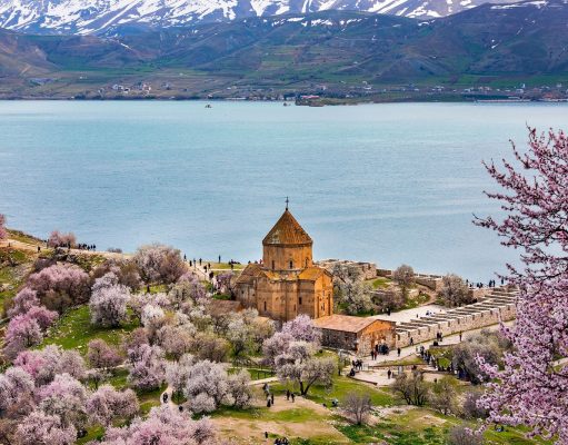 The Answer to All Your Questions A large body of water with a mountain in the background