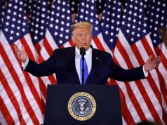 It’s Like Uber, But For American Democracy Donald Trump wearing a suit and tie