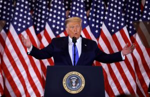 It’s Like Uber, But For American Democracy Donald Trump wearing a suit and tie