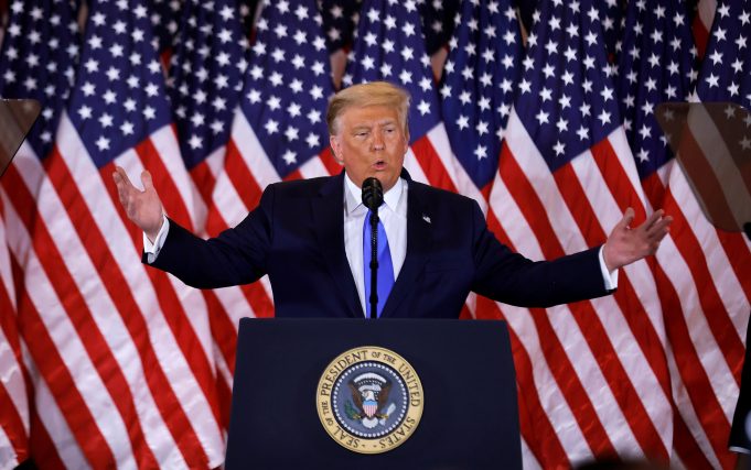 It’s Like Uber, But For American Democracy Donald Trump wearing a suit and tie