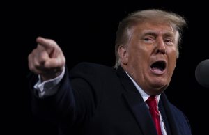 Will The Real Master Persuader Please Stand Up? Donald Trump wearing a suit and tie