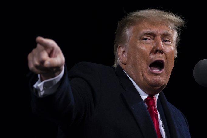 Will The Real Master Persuader Please Stand Up? Donald Trump wearing a suit and tie