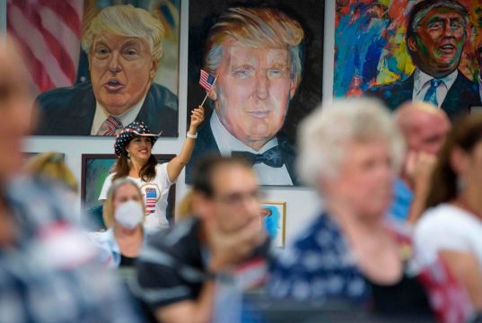 Caricatures of Masculinity A person standing in front of a crowd