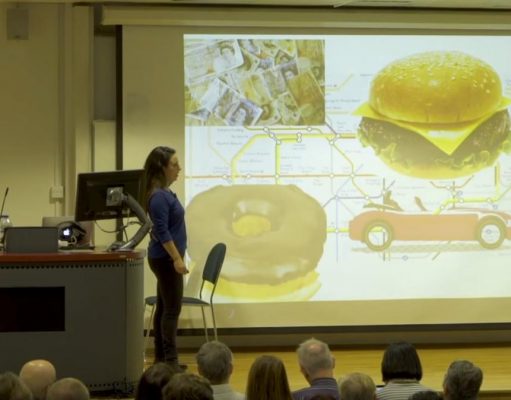 An Introduction To Evolutionary Psychology A group of people standing in front of a television