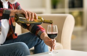 Alcohol is Hurting You A person sitting on a table