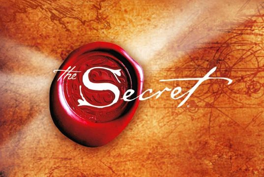 The Secret A pair of sunglasses on a table