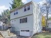 Real Estate In Waltham, Ma A house with trees in the background